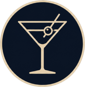 Round navy badge featuring a gold-outline martini glass with an olive on a stick and straw