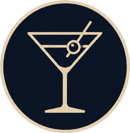 Round navy badge featuring a gold-outline martini glass with an olive on a stick and straw