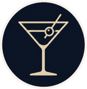 Martini glass icon with an olive on a toothpick on a dark circular background